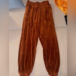 Orange suede joggers with tie and pockets